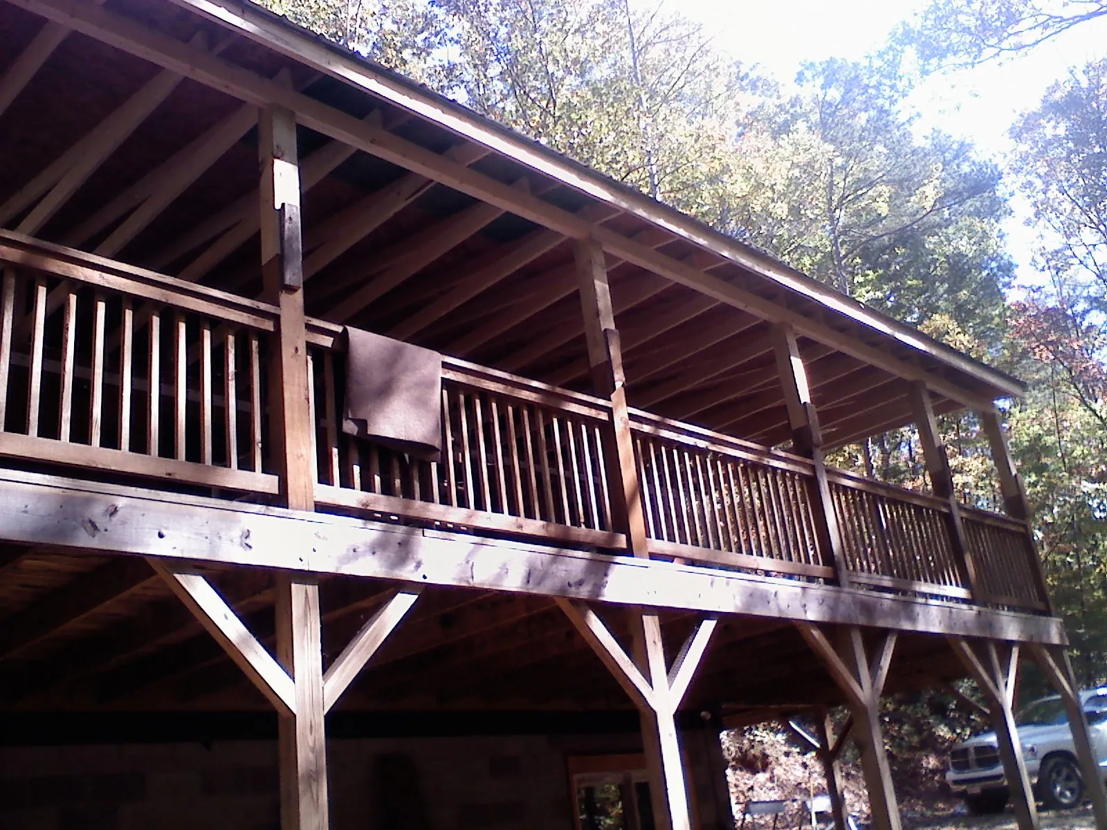 Timber framing under a new elevated porch and deck — Roof Leak Repair in Sunny Side by Roofing Brothers